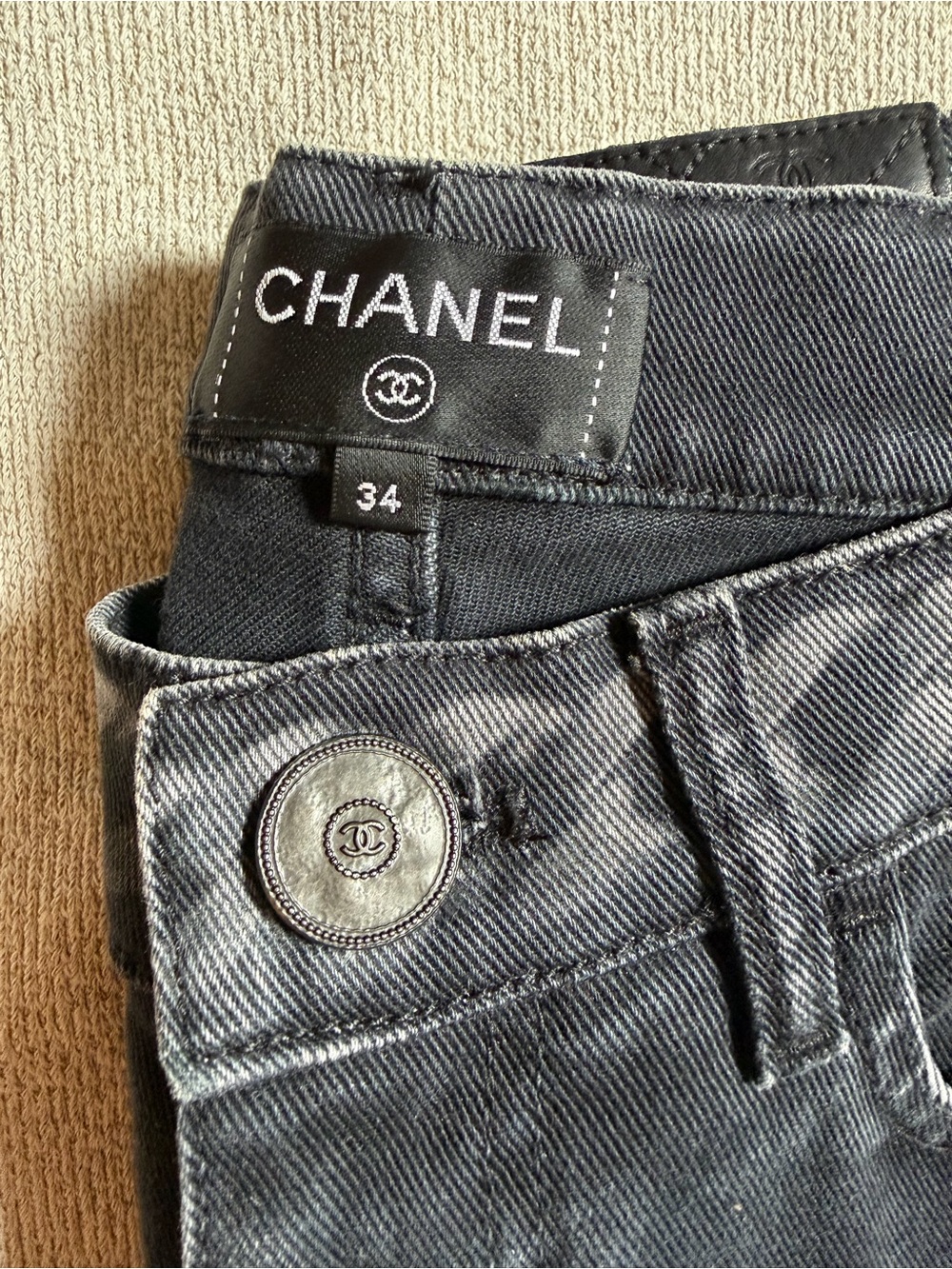 CHANEL Black Washed Denim Jeans with Signature Button